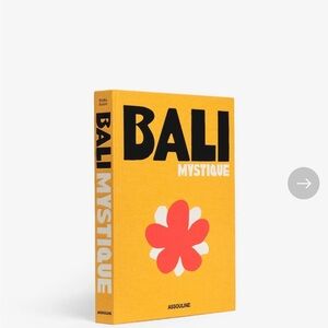 Assouline Bali Mystique Yellow Book with Red Floral Design